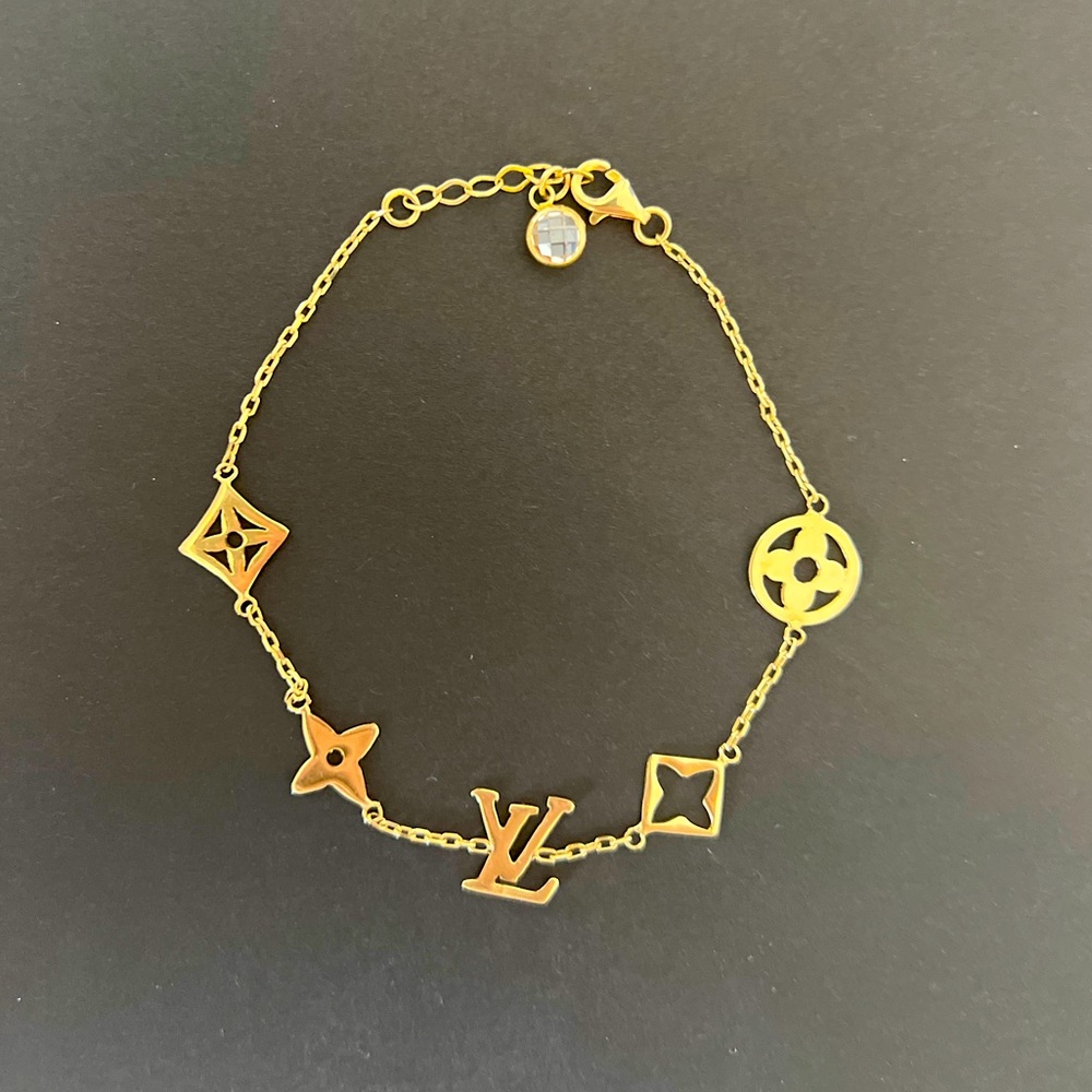 LV 585 stamp gold bracelet